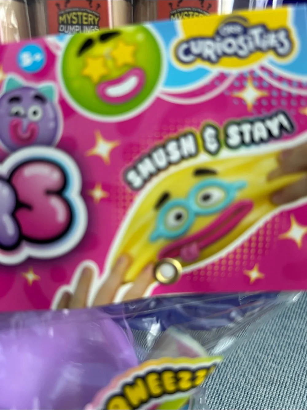 Usher Smusher Squishy Character - Purple with Pink Mouth and Blue Eyelids